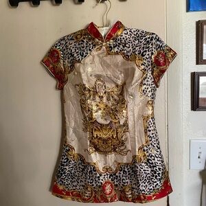 Elegant Women's Blouse with Gold and Red Accents